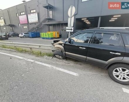 Черный Хендай Туксон, объемом двигателя 2.7 л и пробегом 275 тыс. км за 5500 $, фото 3 на Automoto.ua