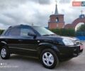 Черный Хендай Туксон, объемом двигателя 2 л и пробегом 237 тыс. км за 7999 $, фото 14 на Automoto.ua