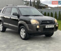Черный Хендай Туксон, объемом двигателя 2 л и пробегом 216 тыс. км за 7700 $, фото 10 на Automoto.ua