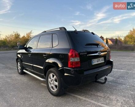 Черный Хендай Туксон, объемом двигателя 2 л и пробегом 235 тыс. км за 6700 $, фото 9 на Automoto.ua