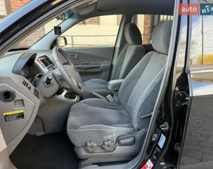 Черный Хендай Туксон, объемом двигателя 2 л и пробегом 249 тыс. км за 7450 $, фото 18 на Automoto.ua