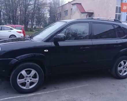 Черный Хендай Туксон, объемом двигателя 1.98 л и пробегом 320 тыс. км за 6300 $, фото 5 на Automoto.ua