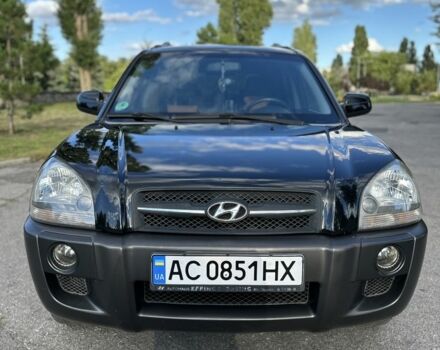 Черный Хендай Туксон, объемом двигателя 2 л и пробегом 249 тыс. км за 5800 $, фото 1 на Automoto.ua