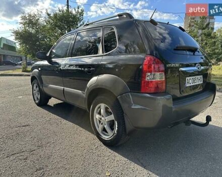 Чорний Хендай Туксон, об'ємом двигуна 2 л та пробігом 249 тис. км за 5800 $, фото 5 на Automoto.ua