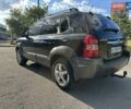 Чорний Хендай Туксон, об'ємом двигуна 2 л та пробігом 249 тис. км за 5800 $, фото 5 на Automoto.ua