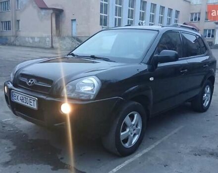 Черный Хендай Туксон, объемом двигателя 1.98 л и пробегом 320 тыс. км за 6300 $, фото 1 на Automoto.ua
