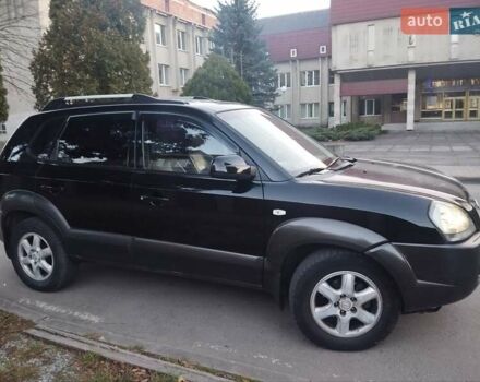 Чорний Хендай Туксон, об'ємом двигуна 1.99 л та пробігом 239 тис. км за 6990 $, фото 5 на Automoto.ua