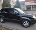 Чорний Хендай Туксон, об'ємом двигуна 1.99 л та пробігом 239 тис. км за 6990 $, фото 5 на Automoto.ua