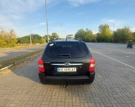Чорний Хендай Туксон, об'ємом двигуна 2 л та пробігом 228 тис. км за 7800 $, фото 4 на Automoto.ua