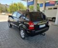 Чорний Хендай Туксон, об'ємом двигуна 1.98 л та пробігом 226 тис. км за 8800 $, фото 10 на Automoto.ua