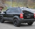Черный Хендай Туксон, объемом двигателя 2.7 л и пробегом 217 тыс. км за 8600 $, фото 3 на Automoto.ua