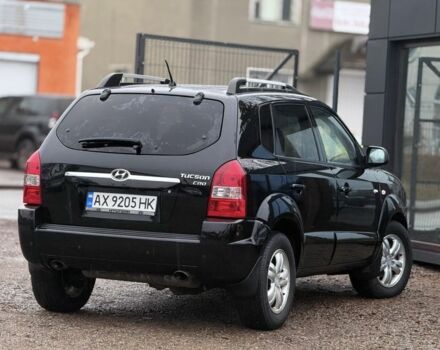 Черный Хендай Туксон, объемом двигателя 2 л и пробегом 263 тыс. км за 7950 $, фото 3 на Automoto.ua