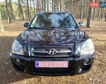 Черный Хендай Туксон, объемом двигателя 2 л и пробегом 195 тыс. км за 8300 $, фото 1 на Automoto.ua
