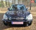 Черный Хендай Туксон, объемом двигателя 2 л и пробегом 195 тыс. км за 8300 $, фото 1 на Automoto.ua