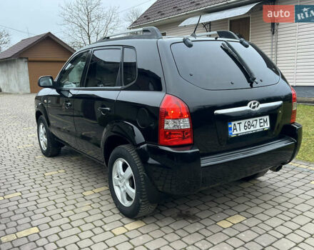 Чорний Хендай Туксон, об'ємом двигуна 1.98 л та пробігом 185 тис. км за 6850 $, фото 3 на Automoto.ua