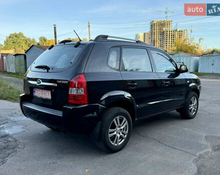 Черный Хендай Туксон, объемом двигателя 2 л и пробегом 189 тыс. км за 7150 $, фото 8 на Automoto.ua