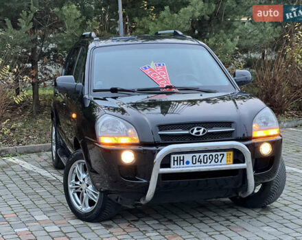 Чорний Хендай Туксон, об'ємом двигуна 1.98 л та пробігом 170 тис. км за 6999 $, фото 4 на Automoto.ua