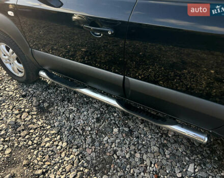 Черный Хендай Туксон, объемом двигателя 1.98 л и пробегом 191 тыс. км за 8300 $, фото 17 на Automoto.ua