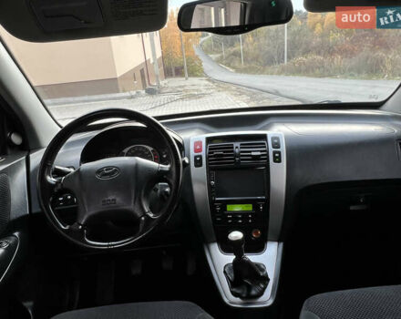 Хендай Туксон 2006 у Тернополі на Automoto.ua Чорний Хендай Туксон, об'ємом двигуна 2 л та пробігом 240 тис. км за 6699 $, фото 44 на Automoto.ua