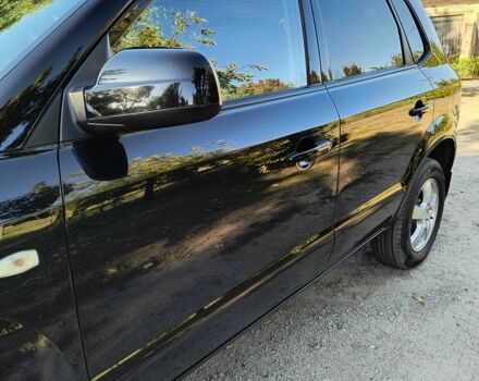 Черный Хендай Туксон, объемом двигателя 2 л и пробегом 206 тыс. км за 7500 $, фото 1 на Automoto.ua