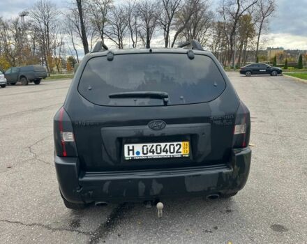 Черный Хендай Туксон, объемом двигателя 2 л и пробегом 397 тыс. км за 3900 $, фото 4 на Automoto.ua