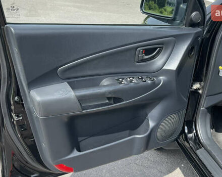 Черный Хендай Туксон, объемом двигателя 2 л и пробегом 236 тыс. км за 6950 $, фото 16 на Automoto.ua