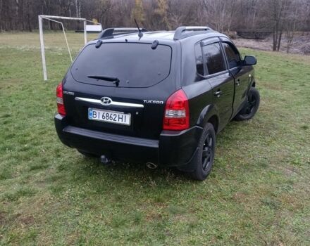 Чорний Хендай Туксон, об'ємом двигуна 2 л та пробігом 220 тис. км за 8300 $, фото 3 на Automoto.ua