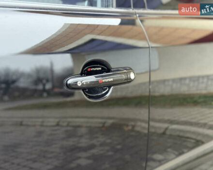 Черный Хендай Туксон, объемом двигателя 1.98 л и пробегом 231 тыс. км за 7750 $, фото 9 на Automoto.ua