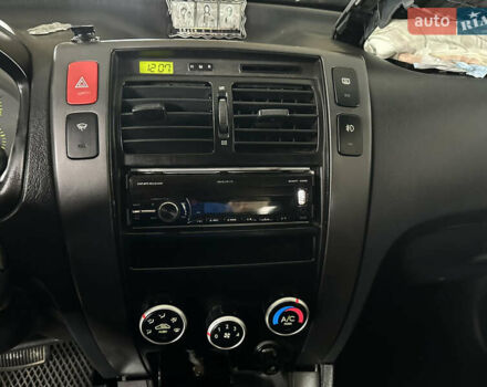 Чорний Хендай Туксон, об'ємом двигуна 2 л та пробігом 252 тис. км за 3000 $, фото 32 на Automoto.ua