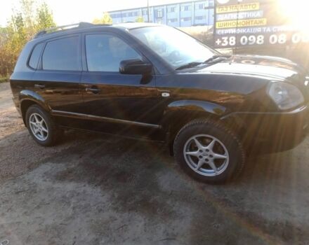 Черный Хендай Туксон, объемом двигателя 2 л и пробегом 203 тыс. км за 7500 $, фото 2 на Automoto.ua