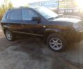Черный Хендай Туксон, объемом двигателя 2 л и пробегом 203 тыс. км за 7500 $, фото 2 на Automoto.ua