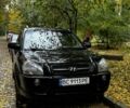 Черный Хендай Туксон, объемом двигателя 2 л и пробегом 240 тыс. км за 5600 $, фото 1 на Automoto.ua