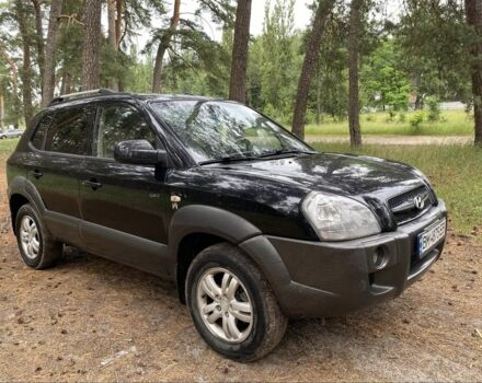 Черный Хендай Туксон, объемом двигателя 2 л и пробегом 227 тыс. км за 6950 $, фото 2 на Automoto.ua
