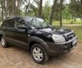 Черный Хендай Туксон, объемом двигателя 2 л и пробегом 227 тыс. км за 6950 $, фото 2 на Automoto.ua