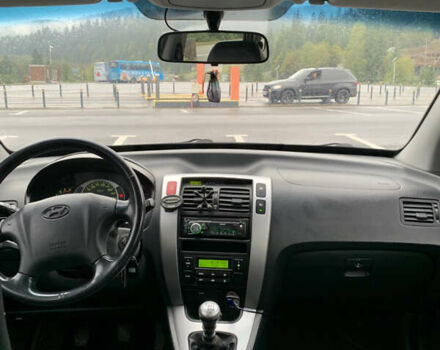 Черный Хендай Туксон, объемом двигателя 2 л и пробегом 277 тыс. км за 7900 $, фото 18 на Automoto.ua