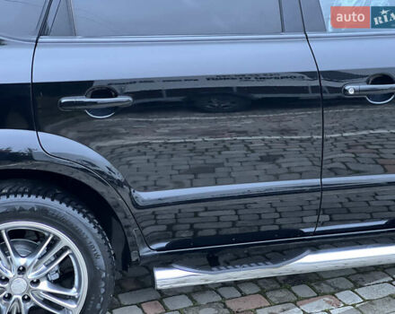 Чорний Хендай Туксон, об'ємом двигуна 1.98 л та пробігом 170 тис. км за 6999 $, фото 17 на Automoto.ua