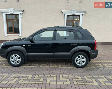Черный Хендай Туксон, объемом двигателя 1.98 л и пробегом 227 тыс. км за 6900 $, фото 9 на Automoto.ua