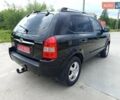 Черный Хендай Туксон, объемом двигателя 2 л и пробегом 216 тыс. км за 6999 $, фото 12 на Automoto.ua