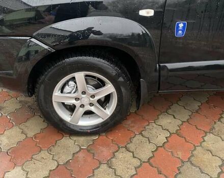 Чорний Хендай Туксон, об'ємом двигуна 1.98 л та пробігом 202 тис. км за 7350 $, фото 5 на Automoto.ua