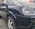 Черный Хендай Туксон, объемом двигателя 2 л и пробегом 127 тыс. км за 7590 $, фото 14 на Automoto.ua