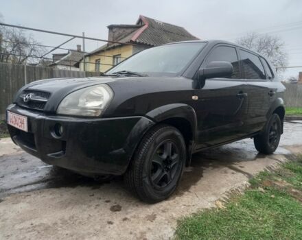 Черный Хендай Туксон, объемом двигателя 2 л и пробегом 395 тыс. км за 4500 $, фото 12 на Automoto.ua