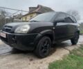 Черный Хендай Туксон, объемом двигателя 2 л и пробегом 395 тыс. км за 4500 $, фото 12 на Automoto.ua