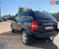 Чорний Хендай Туксон, об'ємом двигуна 2 л та пробігом 230 тис. км за 7300 $, фото 4 на Automoto.ua