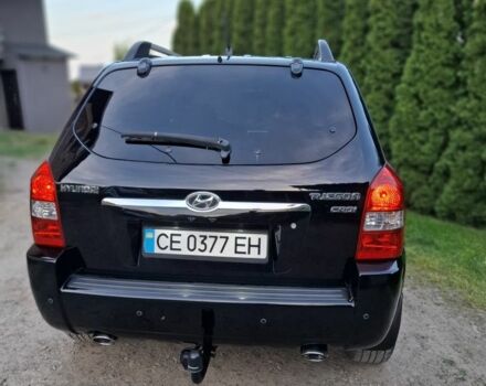 Черный Хендай Туксон, объемом двигателя 2 л и пробегом 254 тыс. км за 8300 $, фото 18 на Automoto.ua
