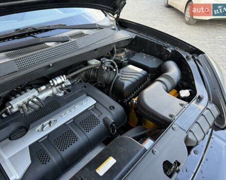 Черный Хендай Туксон, объемом двигателя 2 л и пробегом 249 тыс. км за 7450 $, фото 31 на Automoto.ua