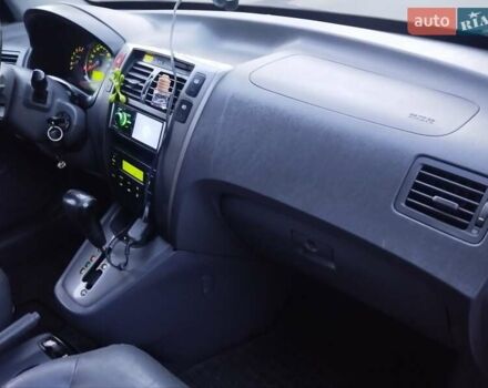 Чорний Хендай Туксон, об'ємом двигуна 1.99 л та пробігом 239 тис. км за 6990 $, фото 19 на Automoto.ua