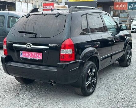 Чорний Хендай Туксон, об'ємом двигуна 2 л та пробігом 167 тис. км за 7950 $, фото 3 на Automoto.ua