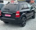 Чорний Хендай Туксон, об'ємом двигуна 2 л та пробігом 167 тис. км за 7950 $, фото 3 на Automoto.ua