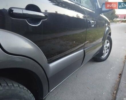 Чорний Хендай Туксон, об'ємом двигуна 1.99 л та пробігом 239 тис. км за 6990 $, фото 8 на Automoto.ua