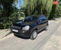 Черный Хендай Туксон, объемом двигателя 2 л и пробегом 255 тыс. км за 7150 $, фото 1 на Automoto.ua